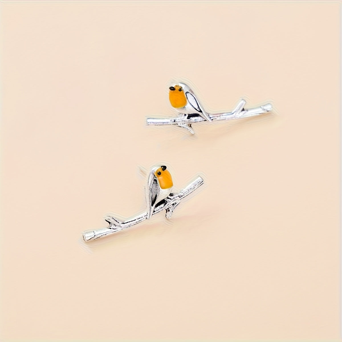 Ohrringe mit Vogel-Motiv