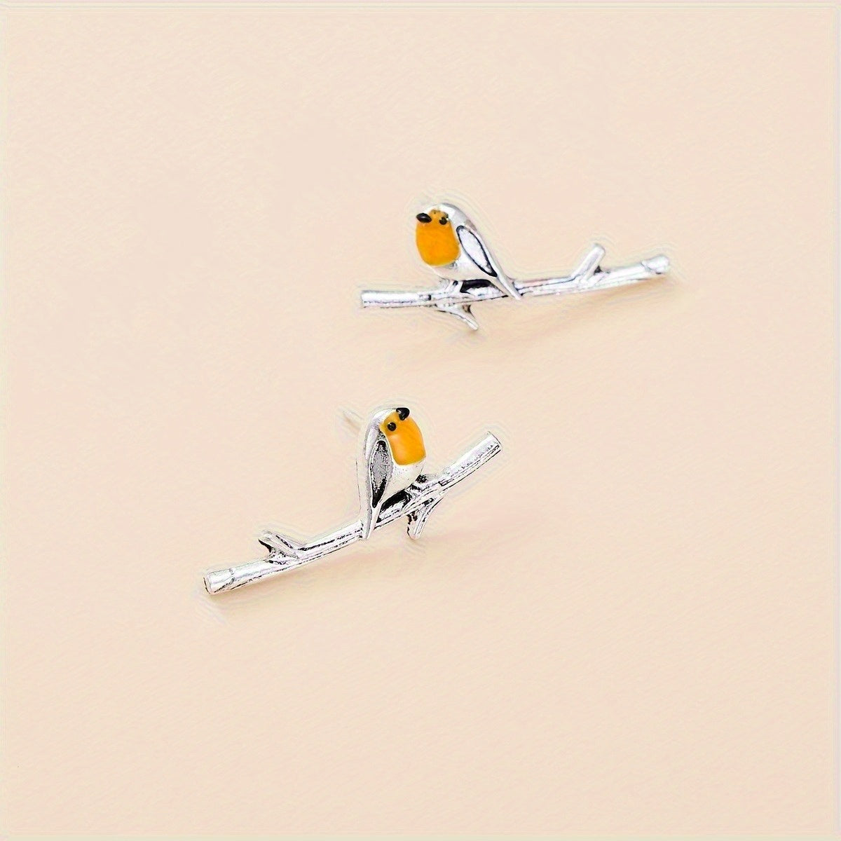 Ohrringe mit Vogel-Motiv