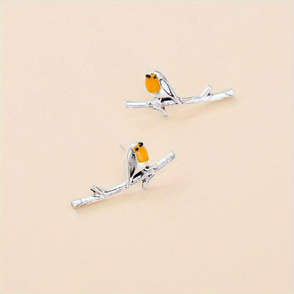 Ohrringe mit Vogel-Motiv