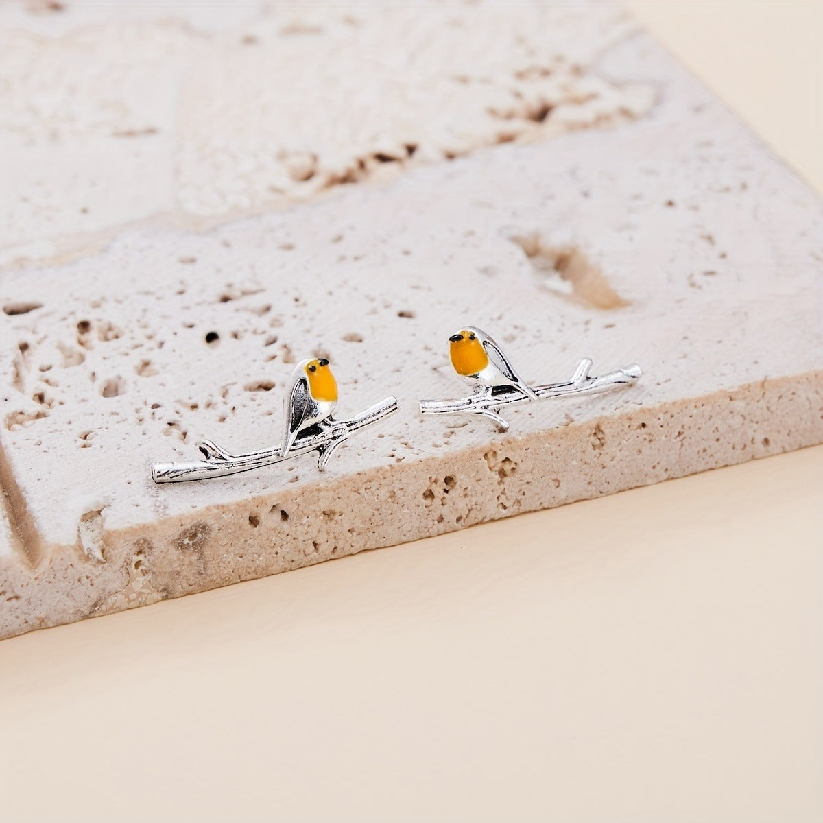 Ohrringe mit Vogel-Motiv